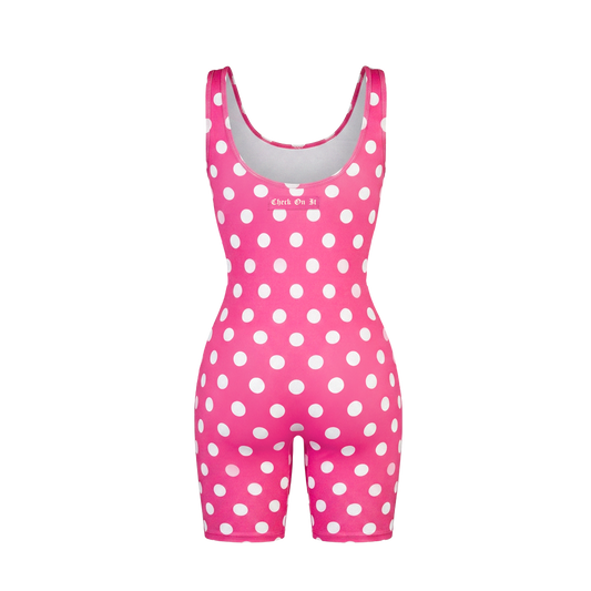 Check On It pink polka dot playsuit, back view of the sleeveless unitard