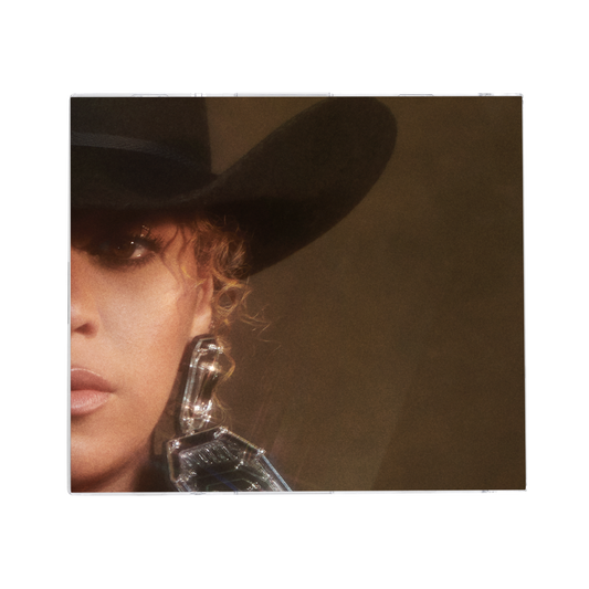 Cowboy Carter blue CD cover artwork, portrait in a black cowboy hat with silver braids