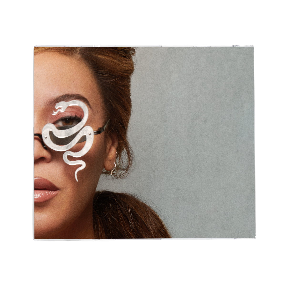 Cowboy Carter white CD cover artwork, portrait with a white serpent across the eyes