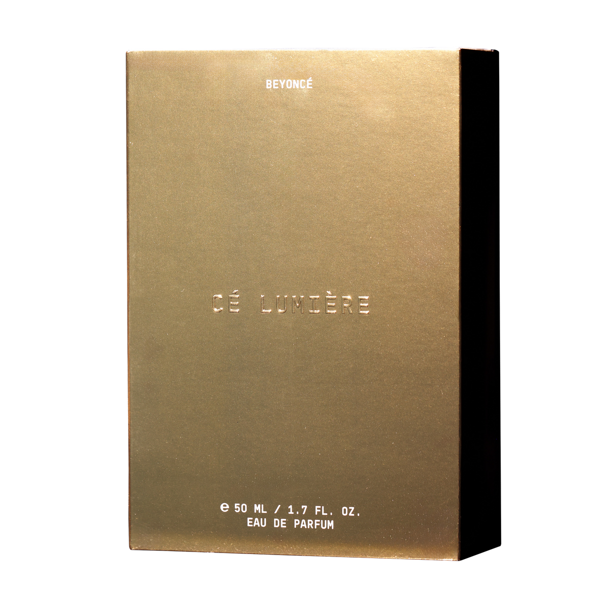 Cé Lumière 50ml carton, brushed gold box with the fragrance name embossed on the front