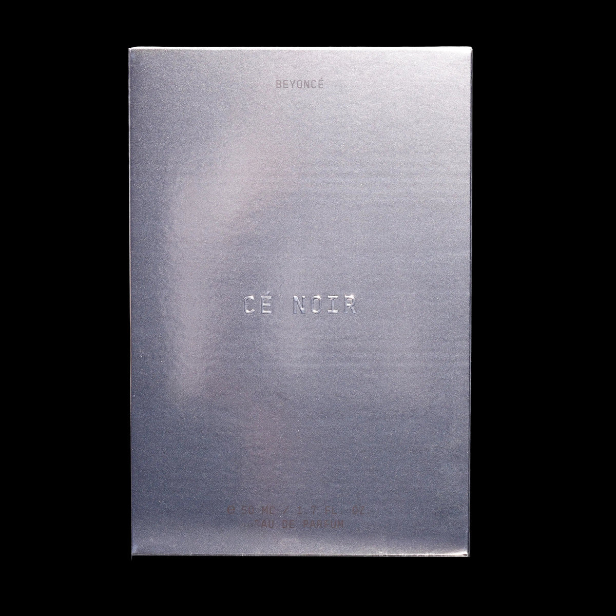 Cé Noir 50ml carton, brushed silver box with the fragrance name embossed, on black