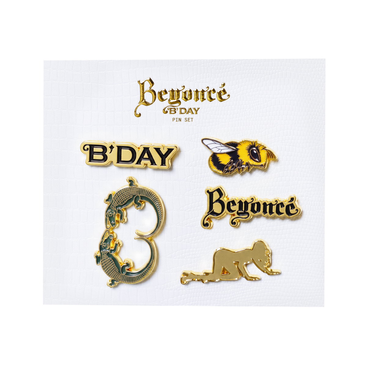 Beyoncé B'DAY 20 enamel pin set, six gold pins including a bee, an ornate B and the B'DAY script