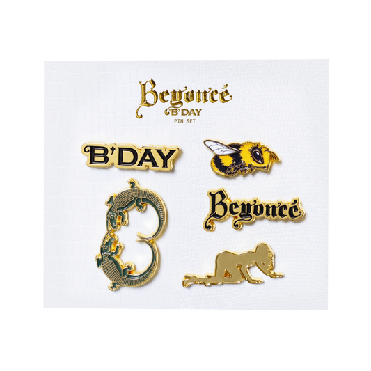 Beyoncé B'DAY 20 enamel pin set, six gold pins including a bee, an ornate B and the B'DAY script
